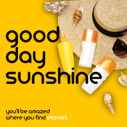 Outdoor skin care products next to a sun hat