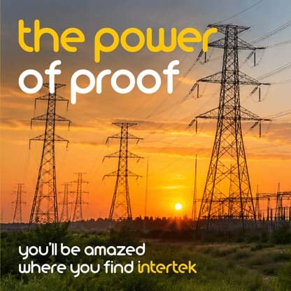 A field of power lines with the sun low on the horizon