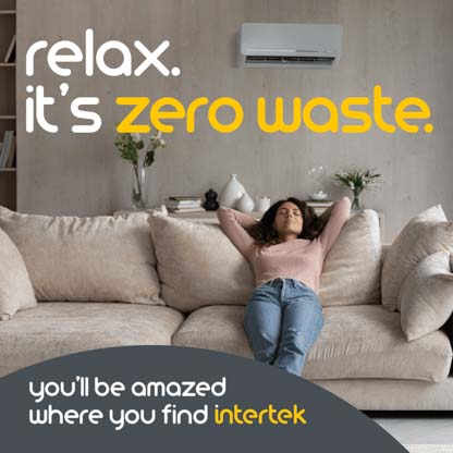 A woman reclining on a living room couch
